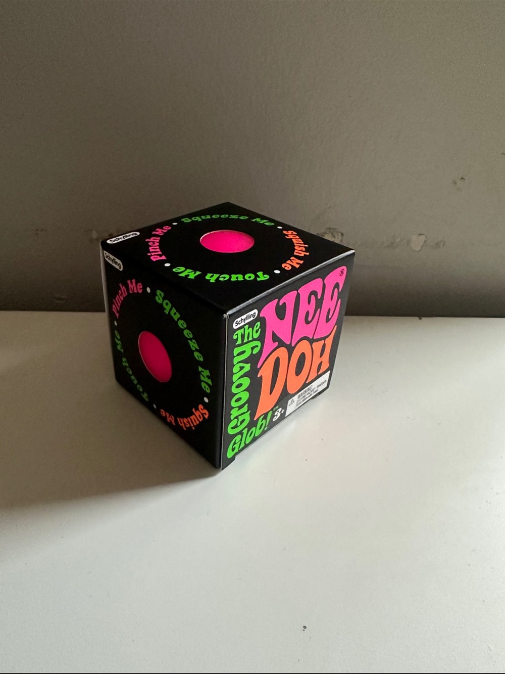 AUTHENTIC, BRAND NEW! 
The Groovy Globe Squeeze Toy - Pink